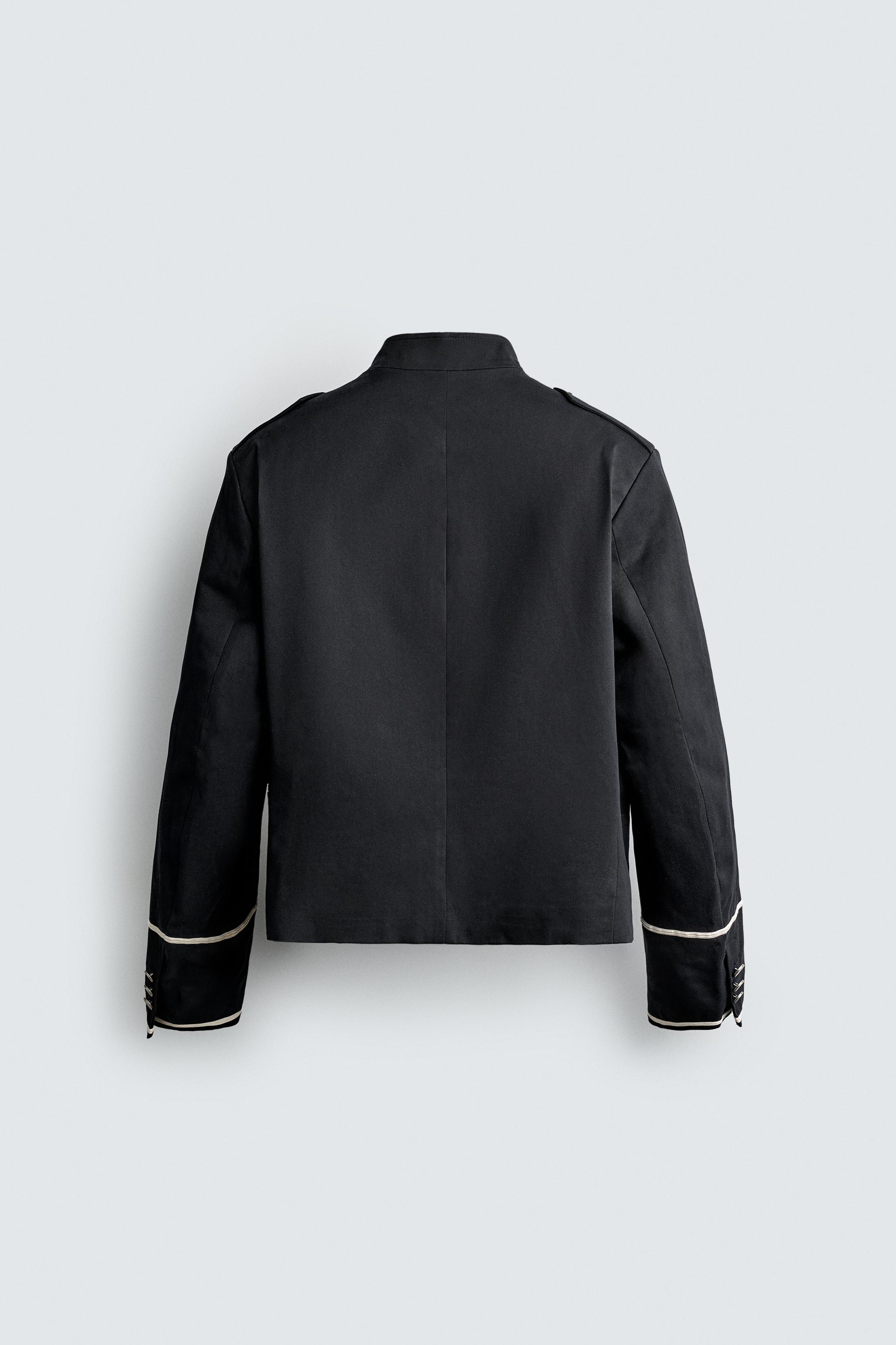 VESTE COURTE À CONTRASTES
